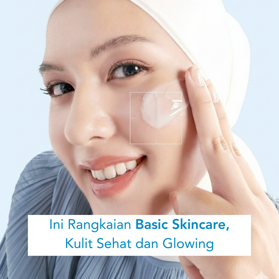 Seorang wanita berhijab menggunakan pelembab di pipinya